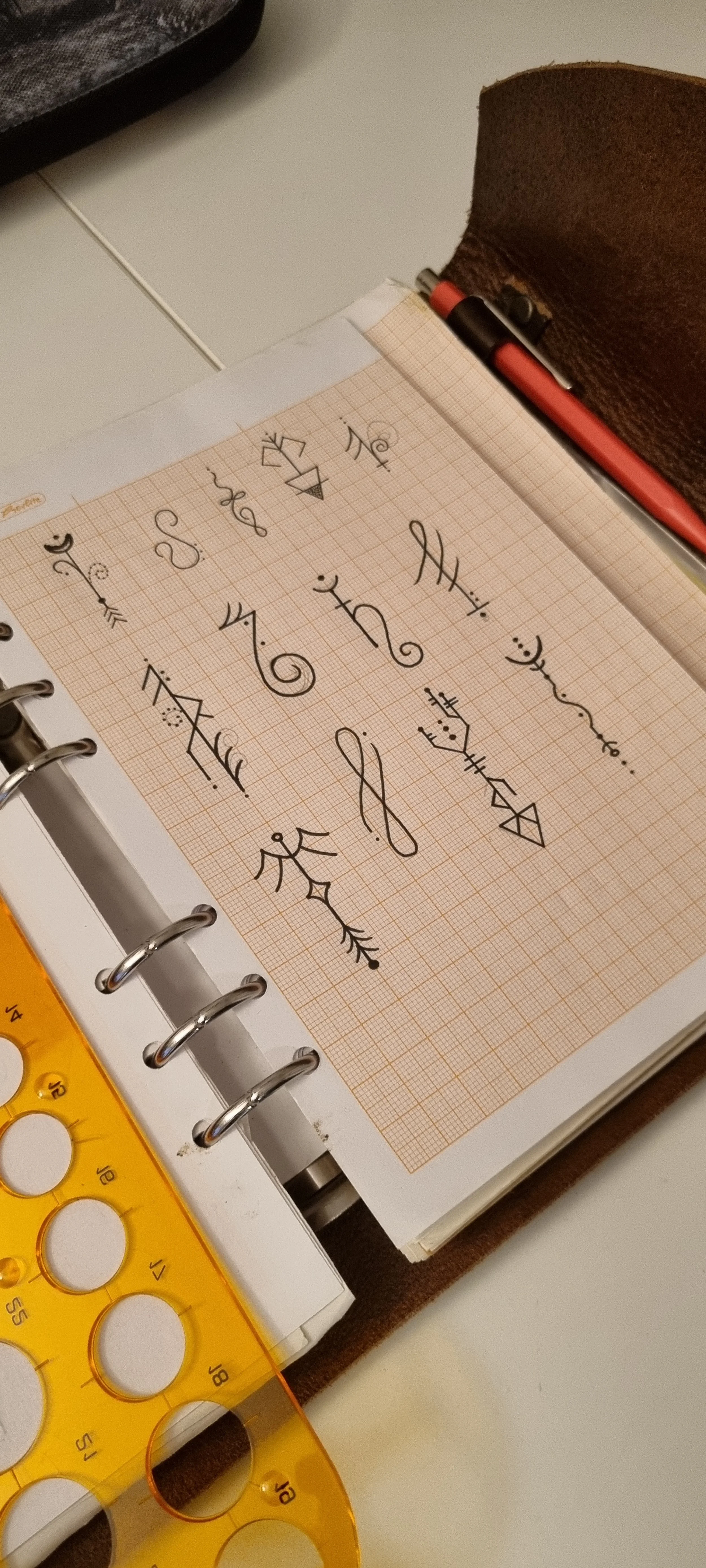 Notebook with mystical symbols